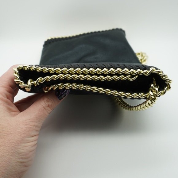 Steve Madden Black Satiny Fold Over Crossbody Purse with Gold Tone Chain - Picture 4 of 10